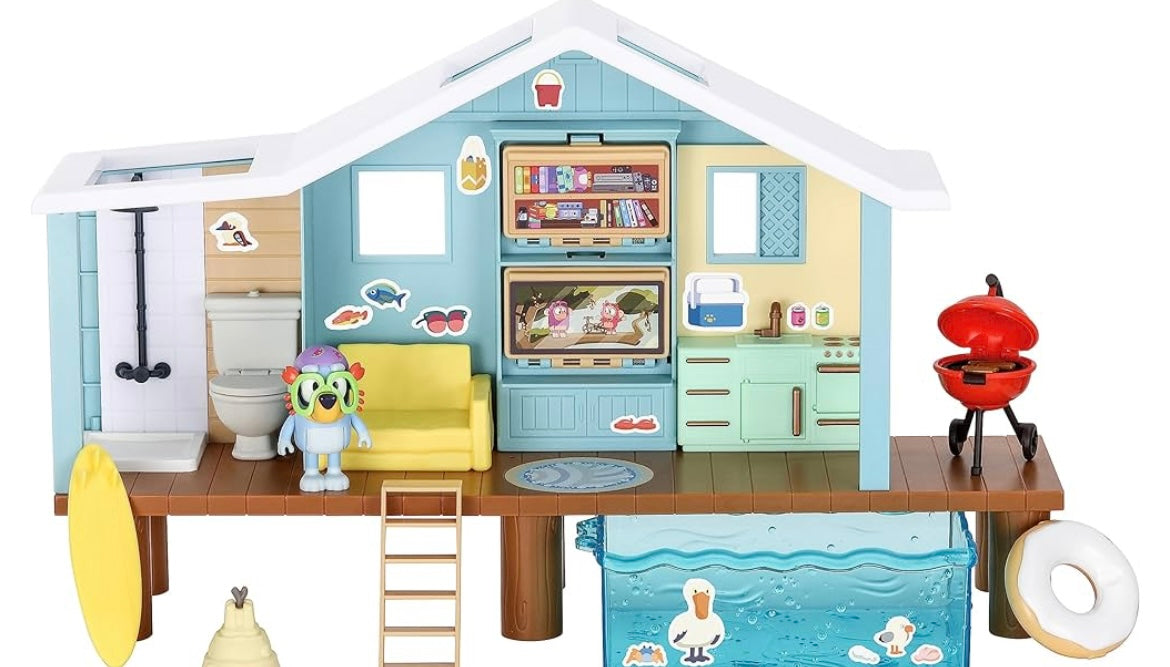 Bluey's Beach Cabin Playset, With Exclusive Bluey Figure With Goggles. Includes 10 Play Pieces and Sticker Sheet